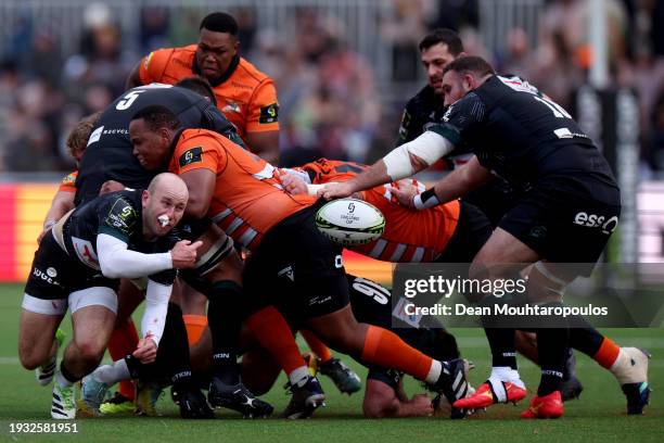 Dan Robson of Section Paloise passes the ball out from the scrum during the EPCR Challenge Cup match between Toyota Cheetahs and Section Paloise at...