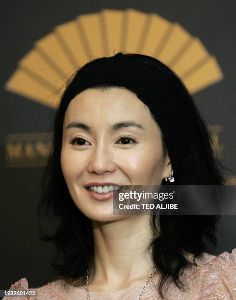 Hong Kong actress Magie Cheung poses for a photo during the ribbon-cutting ceremony on the occasion of the re-opening of the Mandarin hotel in Hong...