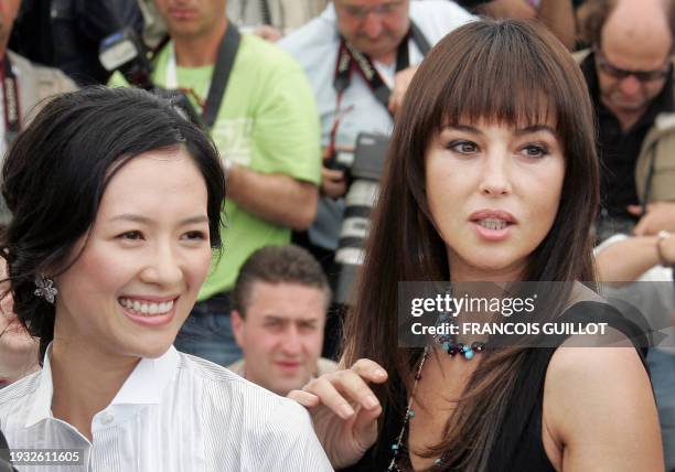 Members of the Jury of the 59th edition of the Cannes Film Festival Chinese actress Zhang Ziyi and Italian actress Monica Bellucci pose during a...