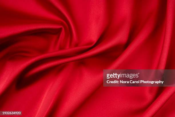 wave pattern red silk background - textile stock pictures, royalty-free photos & images