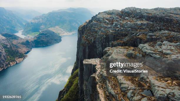 high-angle view of idyllic landscape with preikestolen and lysefjord in norway - norway stock pictures, royalty-free photos & images