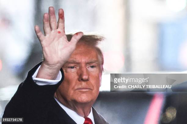 Former US President Donald Trump leaves Trump Tower for Manhattan federal court for the second defamation trial against him, in New York City on...