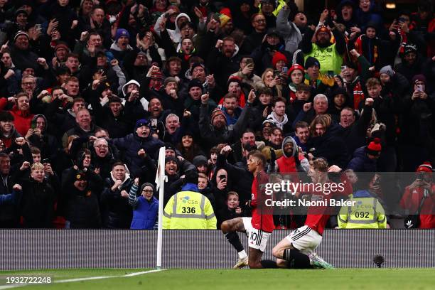 Marcus Rashford of Manchester United celebrates with team mate Rasmus Hojlund after scoring their team's second goal during the Premier League match...