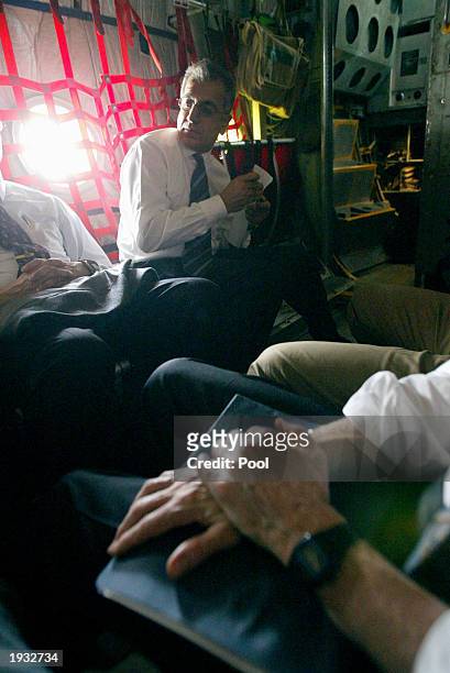 Zalmay Khalilzad , White House special envoy to Iraq, sits next to David Litt , political advisor to U.S. General Tommy Franks, and Ryan Crocker ,...