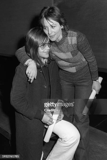 French actress Annie Girardot embraces her daughter Giulia Salvatori while she rehearses the play "Madame Marguerite" on March 30, 1975 at the...