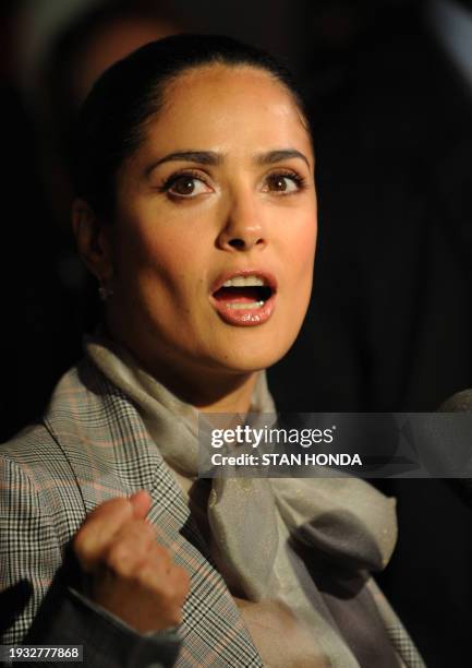 Mexican actress Salma Hayek speaks after christening Puma's "Il Mostro" boat on May 12, 2008 in Boston harbor. Puma unveiled the new Open 70's boat...