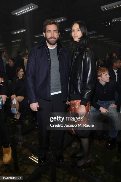Jake Gyllenhaal and Jeanne Cadieu attend the Prada Fall/Winter 2024 Menswear Fashion Show on January 14, 2024 in Milan, Italy.