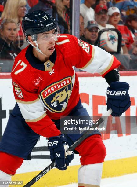 Evan Rodrigues of the Florida Panthers passes the puck against the New Jersey Devils at the Amerant Bank Arena on January 13, 2024 in Sunrise,...