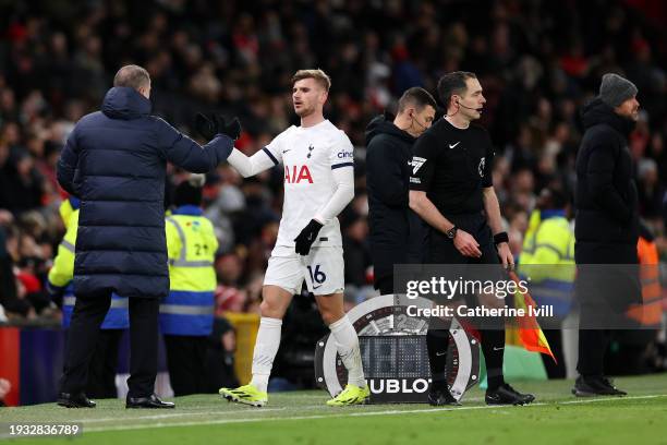 Ange Postecoglou, Manager of Tottenham Hotspur, embraces Timo Werner of Tottenham Hotspur as he is substituted off during the Premier League match...