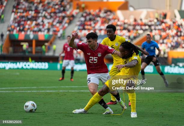 Ahmed Mostafa Mohamed Sayed of Egypt and Edmilson Gabriel Dove of Mozambique during the TotalEnergies CAF Africa Cup of Nations group stage match...