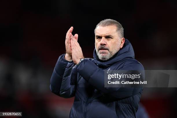 Ange Postecoglou, Manager of Tottenham Hotspur, acknowledges the fans following the Premier League match between Manchester United and Tottenham...