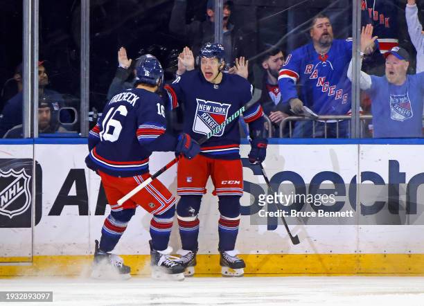 Artemi Panarin scores at 50 seconds of the first period against the Washington Capitals and is joined by Vincent Trocheck at Madison Square Garden on...