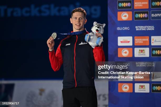 Niall Treacy of Great Britain poses on podium after Men`s 1000m medal ceremony during the ISU European Short Track Speed Skating Championships at...