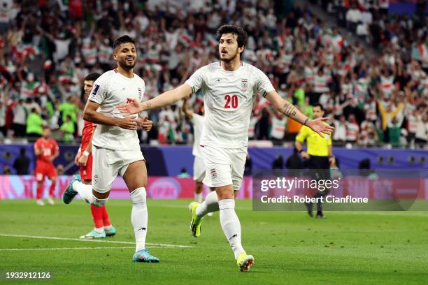 Sardar Azmoun of Iran celebrates scoring their team's fourth goal during the AFC Asian Cup Group C match between Iran and Palestine at Education City...