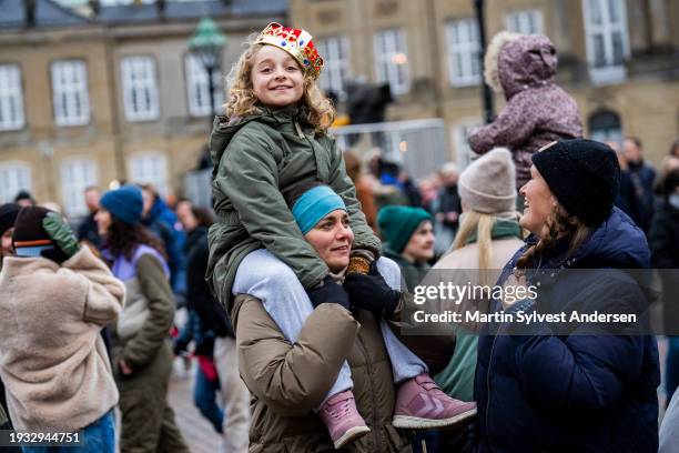 Members of the public waiting for the King to arrive at Amalienborg Palace Square on January 14, 2024 in Copenhagen, Denmark. Her Majesty Queen...