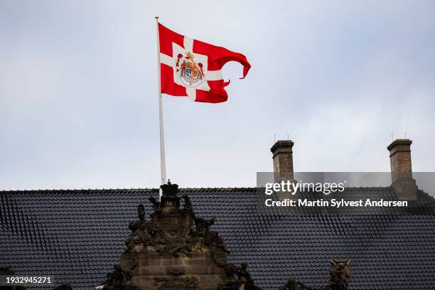 The Royal House Standard of Denmark is raised after the proclamation of HM King Frederik X and HM Queen Mary of Denmark at Amalienborg Palace Square...