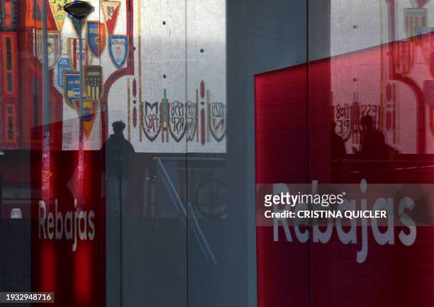 Shop window reads "Rebajas" in Seville on January 17, 2024. The national winter sales in Spain started on January 7, 2024 and will last for two or...