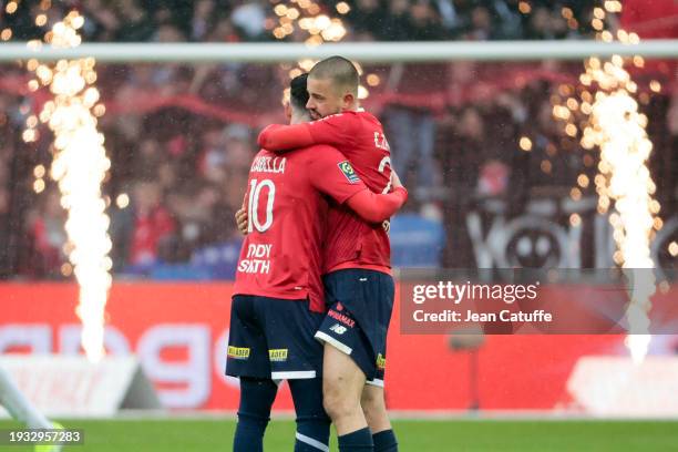 Edon Zhegrova of Lille celebrates his goal with Remy Cabella during the Ligue 1 Uber Eats match between Lille OSC and FC Lorient at Stade...