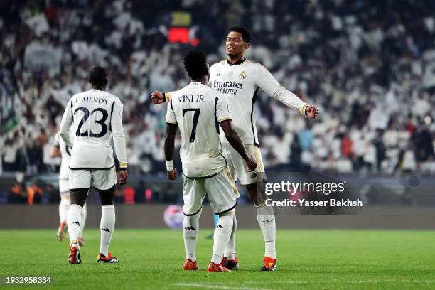 Vinicius Junior of Real Madrid celebrates with teammate Jude Bellingham after scoring their team's first goal during the Super Copa de España Final...