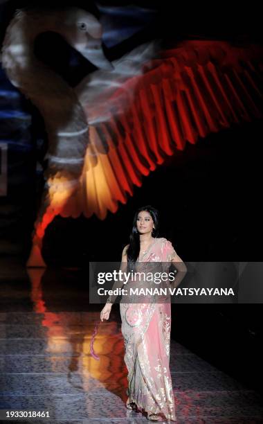 Indian Bollywood actress Amrita Rao presents a creation by Indian designer Suneet Varma during the Wills India Fashion Week Spring Summer 2010 in New...