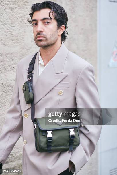 Abdulla Al-Abdulla wears full look Prada outside Prada Show during the Milan Fashion Week - Menswear Fall/Winter 2024-2025 on January 14, 2024 in...