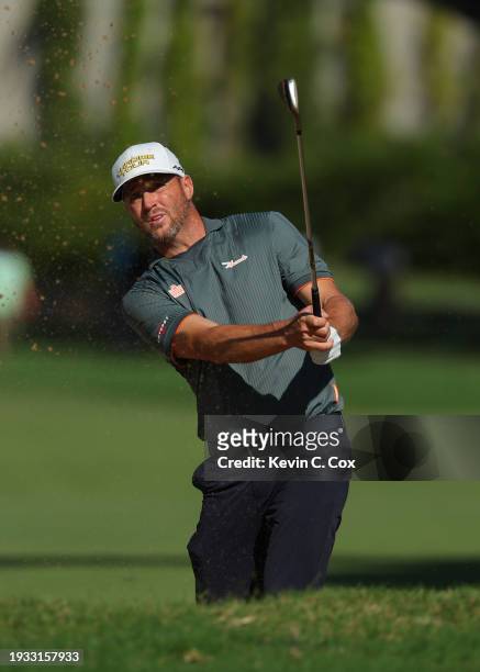 Alex Noren of Sweden plays a shot from a bunker on the sixth hole during the final round of the Sony Open in Hawaii at Waialae Country Club on...