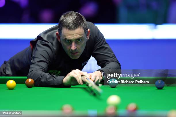 Ronnie O'Sullivan of England prepares to take a shot during the Final match between Ronnie O’Sullivan of England and Ali Carter of England on day...