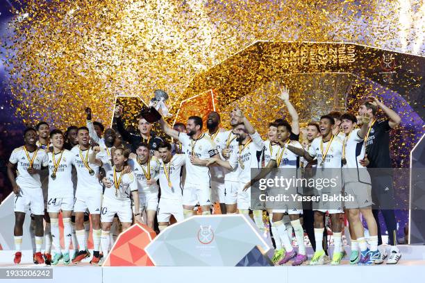 Nacho Fernandez of Real Madrid lifts the Super Copa de España trophy after the team's victory in the Super Copa de España Final match between Real...