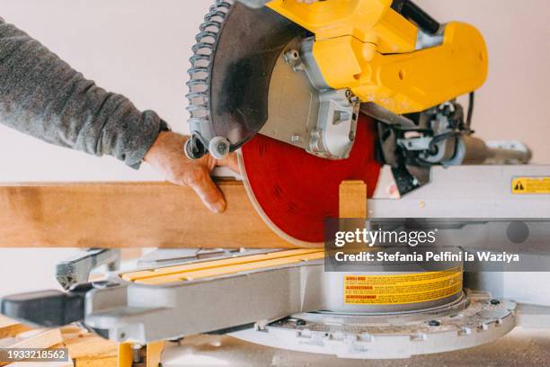 Man Using Drop Saw 35,567 Saw 1 Stock Photos, High-Res Pictures, and Images - Getty Images
