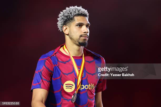 Ronald Araujo of FC Barcelona looks dejected with his runners-up medal after the team's defeat in the Super Copa de España Final match between Real...