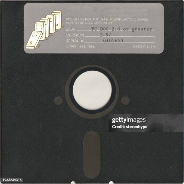 dominos falling floppy disk - book of revelation stock illustrations