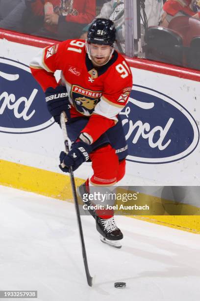 Oliver Ekman-Larsson of the Florida Panthers skates with the puck against the New Jersey Devils at the Amerant Bank Arena on January 13, 2024 in...