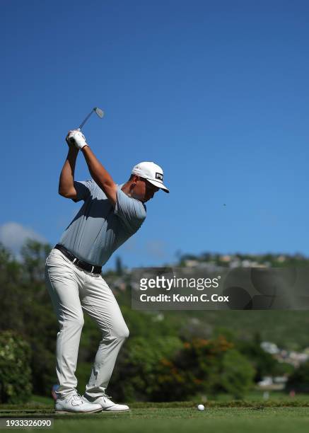 Sam Stevens of the United States plays his shot from the seventh tee during the final round of the Sony Open in Hawaii at Waialae Country Club on...