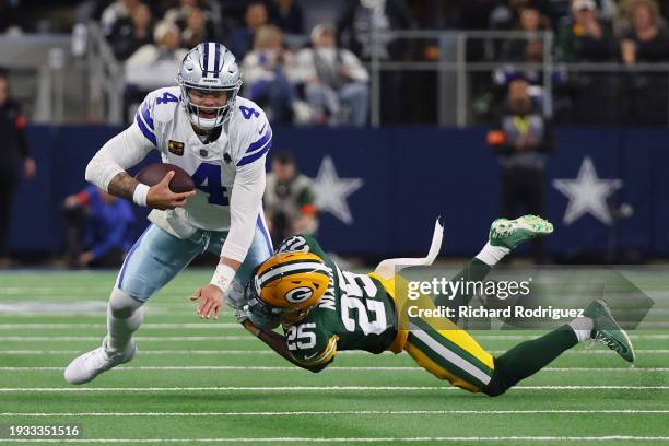 Dak Prescott of the Dallas Cowboys is sacked by Keisean Nixon of the Green Bay Packers during the first half of the NFC Wild Card Playoff game at...