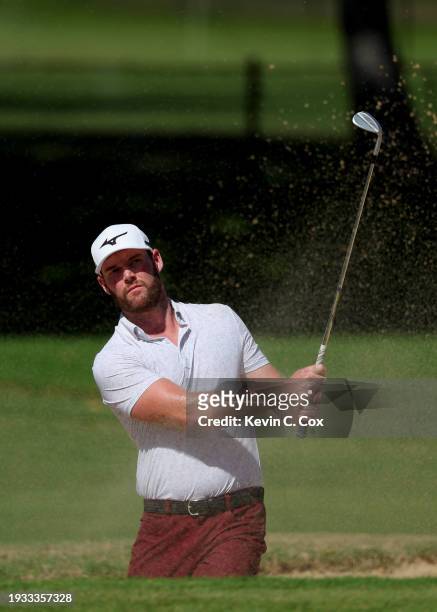 Grayson Murray of the United States plays a shot from a bunker on the ninth hole during the final round of the Sony Open in Hawaii at Waialae Country...
