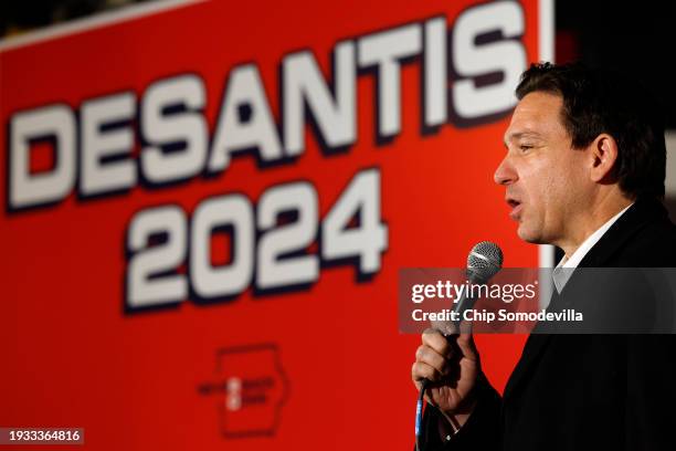 Republican presidential candidate Florida Gov. Ron DeSantis speaks during a campaign event at the Chrome Horse Saloon one day before the Iowa...