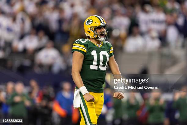 Jordan Love of the Green Bay Packers celebrates after a touchdown during an NFL wild-card playoff football game between the Dallas Cowboys and the...