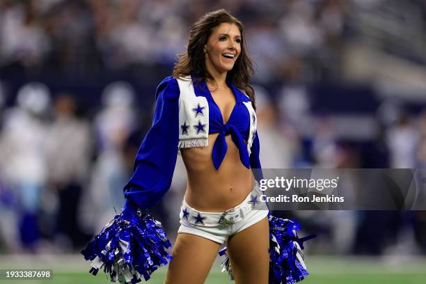 Cheerleader for the Dallas Cowboys performs during the first half of the NFC Wild Card Playoff game between the Green Bay Packers and the Dallas...