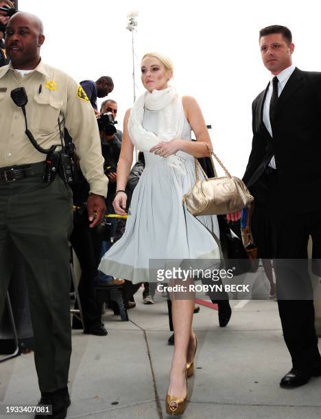 Actress actu Lindsay Lohan arrives for a progress report hearing at the Airport Branch Courthouse in Los Angeles on October 19, 2011. Lohan pleaded...