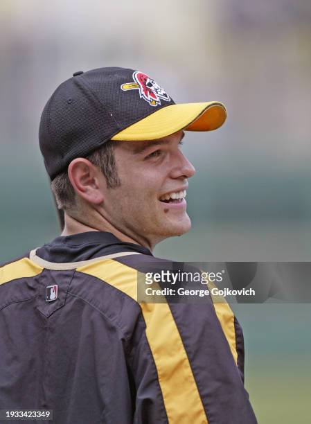 Freddy Sanchez of the Pittsburgh Pirates smiles as he looks on from the field during batting practice before a game against the Tampa Bay Devil Rays...