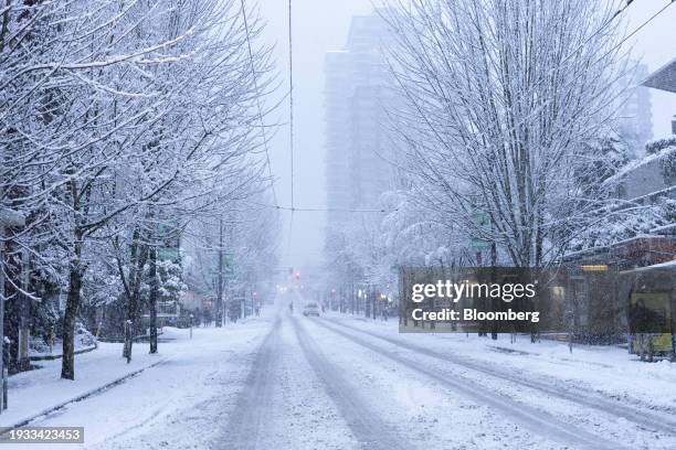 Snow on the street during a snowstorm in Vancouver, British Columbia, Canada, on Wednesday, Jan. 17, 2024. Overnight snow has blanketed southwest...
