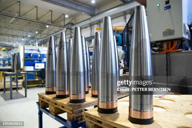 Empty artillery shells stand at the production line of weapons manufacturer Nammo, on January 17, 2024 in Raufoss, Norway.