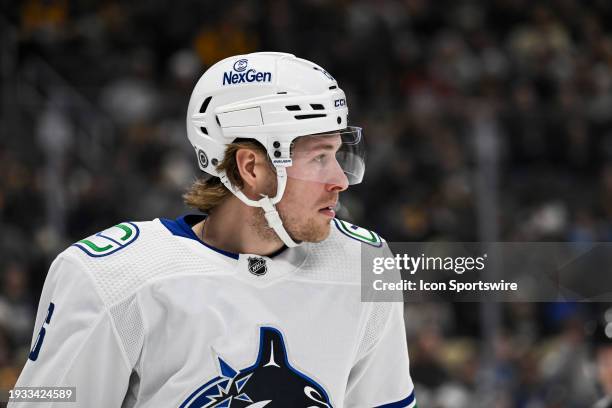 Vancouver Canucks right wing Brock Boeser looks on during the first period in the NHL game between the Pittsburgh Penguins and the Vancouver Canucks...
