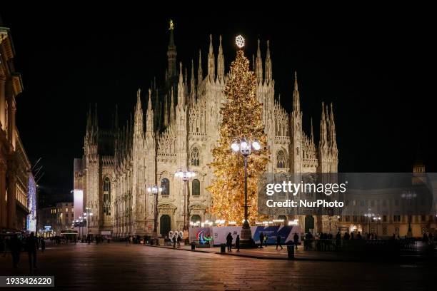 The Duomo Cathedral is standing in Duomo Square, Milan, Italy, during the Christmas period, on December 21, 2023.