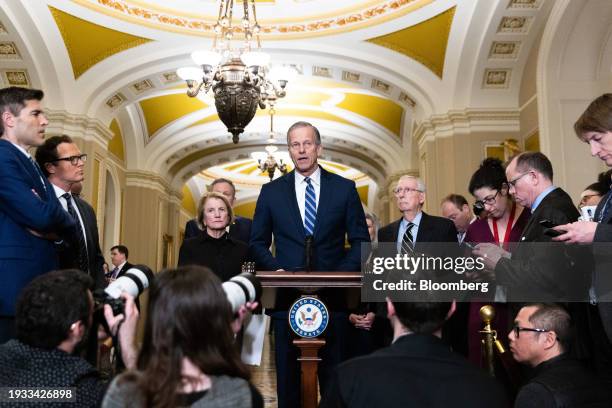 Senator John Thune, a Republican from South Dakota, center, speaks during a news conference following the weekly Republican caucus luncheon at the US...