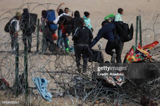 Migrants try to reach the United States border to seek humanitarian asylum in Ciudad Juarez, Mexico on January 17, 2024. Despite the efforts of the...