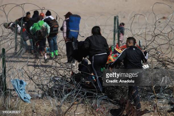 Migrants try to reach the United States border to seek humanitarian asylum in Ciudad Juarez, Mexico on January 17, 2024. Despite the efforts of the...