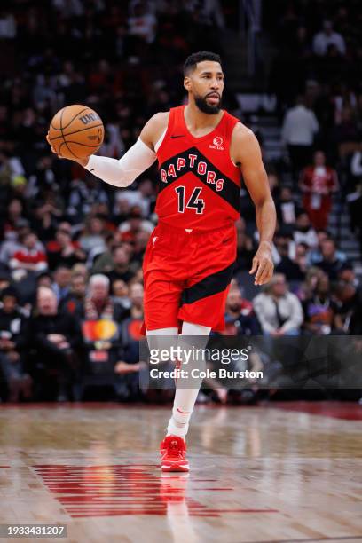 Garrett Temple of the Toronto Raptors brings the ball up court against the Miami Heat during the second half at Scotiabank Arena on January 17, 2024...