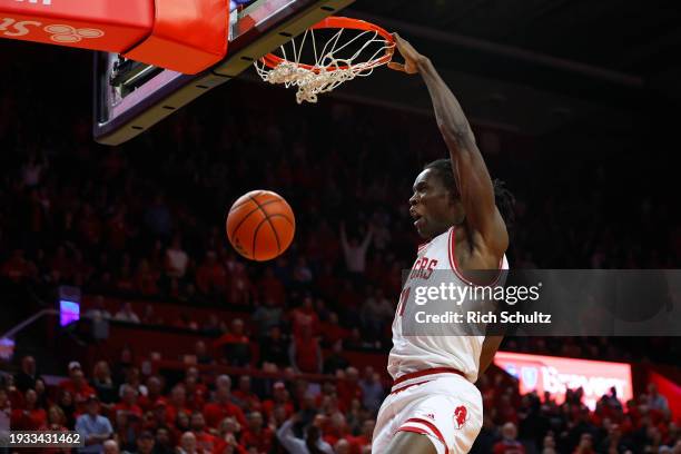 Clifford Omoruyi of the Rutgers Scarlet Knights dunks against the Nebraska Cornhuskers during overtime at Jersey Mike's Arena on January 17, 2024 in...