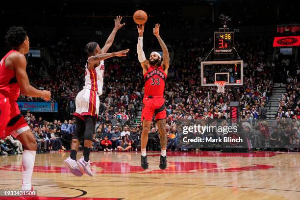 Gary Trent Jr. #33 of the Toronto Raptors shoots the ball during the game against the Miami Heat on January 17, 2024 at the Scotiabank Arena in...